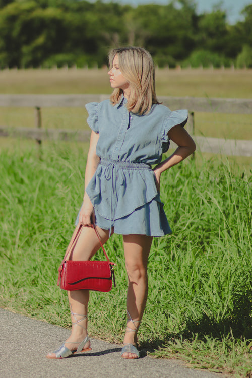 BUTTONED FRONT DENIM ROMPER WITH SMOCKED WAIST